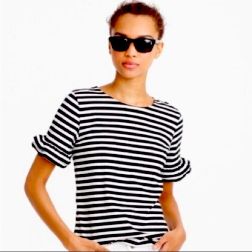 JCrew navy and white striped shirt with ruffle sleeves.